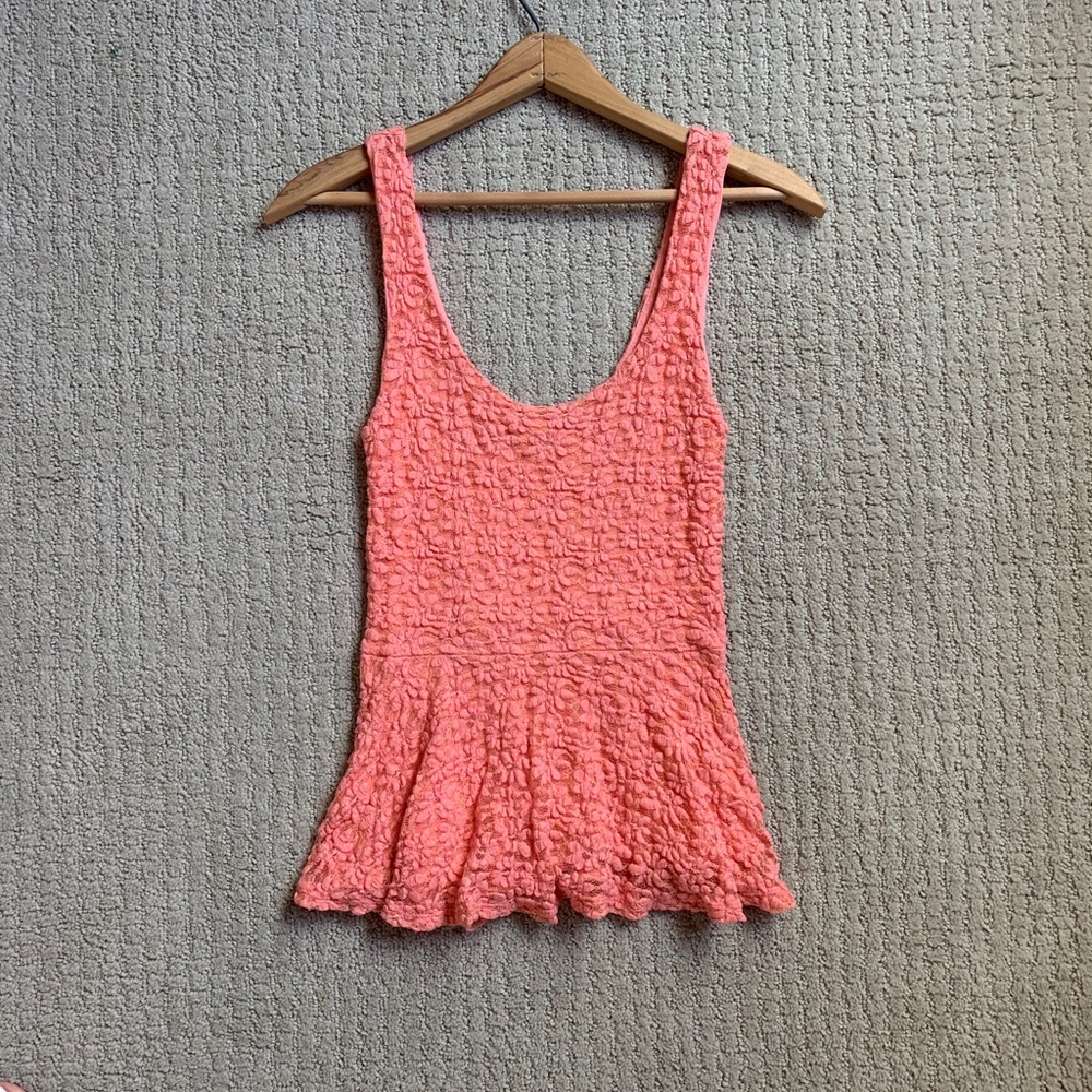 Coral peplum top from Urban Outfitters